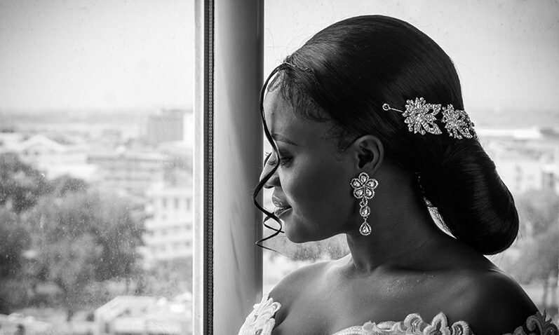 Wedding Bride looking out a window in Accra